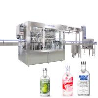 China Glass Packaging Alcohol Bottle Filling Machine 500BPH~10000BPH Liquor Filling Machine on sale