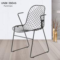 China Outdoor Wrought Iron Patio Dining Chair Art Wire Armrest Hollow 52x51x79.5 Cm on sale