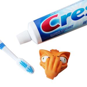 China Creative Funny Carton Dog Head Toothpaste Spread Head Toothpaste Cover supplier