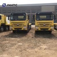 China SINOTRUK Howo Heavy Cargo Truck 35 Tones Flatbed Trailer Tri Axle Flatbed on sale