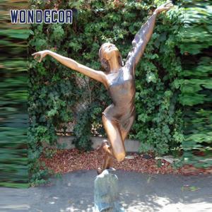 Outdoor garden decoration, a bronze statue of a beautiful woman dancing at the size of a real person