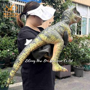 China Tamaño personalizado Bebé Dinosaurio Muñeco de mano verde T Rex para espectáculo de escenario y jardín wholesale