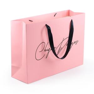 China Custom LOGO Cosmetics Gift CMYK Printable Paper Bags With Handle supplier