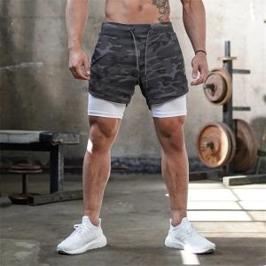 China Homem elástico Mesh Athletic Shorts With Pockets do short do exercício da compressão da cintura supplier