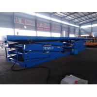 China Custom large load factory warehouse electrohydraulic container load lift table on sale