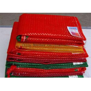 China Orange Color 25kg Mesh Packing Bags , PP Woven Mesh Vegetable Bags For Onions supplier