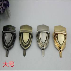 China Promotional bag metal fittings handbag locks modern light gold push lock for leather bags supplier