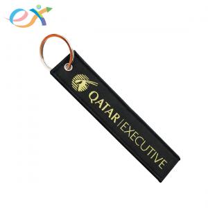 China Polyester Material Woven Keychain Black Bottom Yellow Words With Metal Key Ring supplier