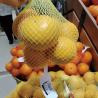 China Full Auto Mesh Net Bag Packing Machine with Clip Function for Potato Onion Garlic Orange Vegetables Mesh Bag Packing Machine wholesale