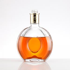 Hot Stamping Sale Round 700ml Brandy Whiskey Glass Bottles with Cork and Tamper Proof