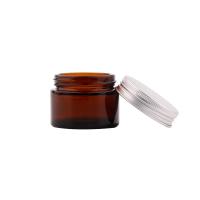 China Amber empty body cream cosmetic jars face cream glass jar with aluminum lid on sale