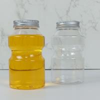 China 0.5L Food Grade PET Plastic Bottles Caps Ring Bucket Shape Juice Milk on sale