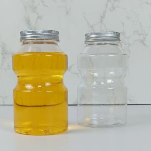 China 0.5L Food Grade PET Plastic Bottles Caps Ring Bucket Shape Juice Milk supplier