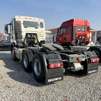 China Howo 6 * 4 Semi-Trailer Tractor Front Double Wheel Drive Freight Truck Front 380 Horsepower Tractor Trailer Head on sale