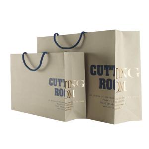 China Custom Recycled Brown Paper Merchandise Bags Wholesale With Gold Foil Logo supplier