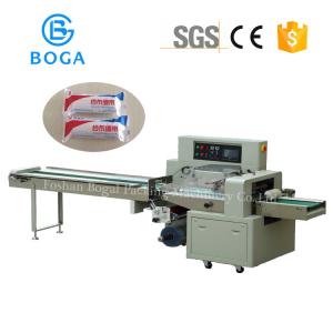 China Automatic High Speed Flow Wrapper Gauze Bandage Towel Roll Surgical Cotton Packaging machine supplier