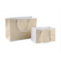 China Customized Size Paper Shopping Bags With Silk Ribbon / Circle Tube Handle on sale