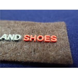 OEKO Custom Clothing Patches Injection Molding Double Color On Non - Woven Fashion 3D Logo