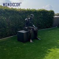 China Outdoor Garden Metal Art Decoration Abstract Sitting Man Bronze Sculpture on sale
