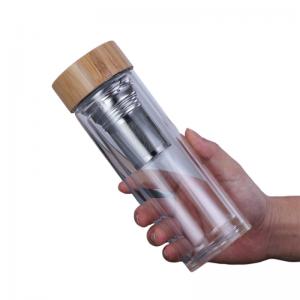 China Customized Borosilicate Glass Bottle , Clear Glass Drinking Bottle With Bamboo Lid supplier