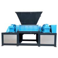 China Waste Rubber Tyre Recycling Machine Scrap Rubber Crusher Double Shaft Shredder With Rotary Screen on sale