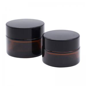 China 5g 20g 4oz 8oz Cosmetic Glass Jars Black Cap Amber Apothecary Jars supplier