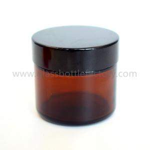 China 2oz 60g Amber Round Glass Cosmetic Jar With Black Lid supplier