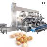 China Máquina automática de recubrimiento de nueces de anacardo y semillas de melón de alta eficiencia y tres estaciones wholesale