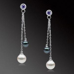 China 925 Sterling Silver Earrings with Two Freshwater Pearls Dangling Beneath the Unique Design on sale 