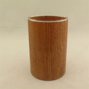 China Long barrel candlestick with some wooden materials supplier