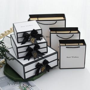 China Whole Sales Luxury Clothes Perfume Gift Set  Package Ribbon Bow Magnetic Closure Cardboard Folding Gift Box supplier