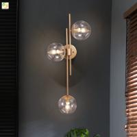 China Simple Background Decorative Glass Post Modern Wall Light For Bedroom Living Room on sale