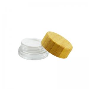 China 5g Frosted Clear Glass Jar with Bamboo Wood Lid Keep Your Cosmetic Face Cream Fresh supplier