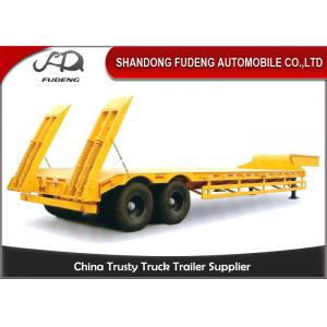 China Double axles low bed truck semi-trailer low flatbed trailer spring suspension supplier