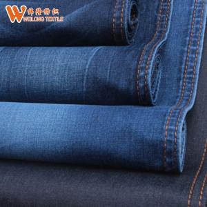 China Mercerizing 56'' Width 11.3oz Stretch Denim Fabric For Woman Pants supplier