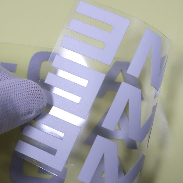 China Custom Silver Reflective In the Dark Ink Heat Transfer Label Garment Press 3D Printing Label Heat Transfer for Garment PET Label wholesale