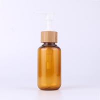 China Glass Roller Plastic Lotion Bottles With Bamboo Cover on sale