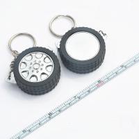 China Tire Shaped Casing Mini Steel Tape Measure Keychain Multifunctional on sale
