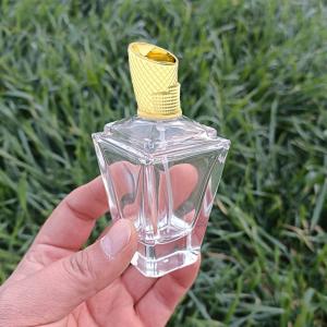 China Abu Dhabi National Exhibition Centre Shape Zamac Perfume Cap with bottle wholesale