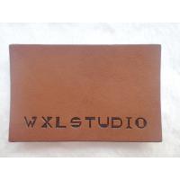 China Personalized Logo Garment Leather Patch Embossed Black Logo Leather Label on sale