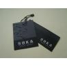 China Printed Paper Hang Tags For Clothing Line Plastic Seal Tag UV Coating Silver Foil Logo wholesale