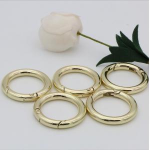 China High end handbag accessories 1 inch gold metal spring ring clasps for webbing supplier