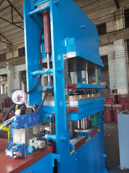 Prensa de moldeo por compresión de caucho para la producción de absorbedores de choque y absorbedores de choque de caucho