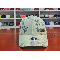China Custom Flower Metal Label Sports Dad Hats Breathable And Waterproof on sale