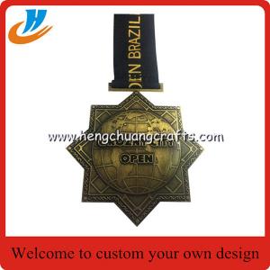 China Antique brass metal medals,zinc alloy die casting events medals with custom logo ribbon supplier