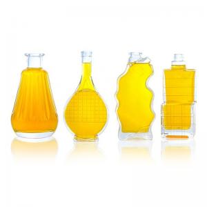 China Glass Products Unique Shaped Bottle 750ml 700ml for Vodka Whiskey Tequila Brandy supplier