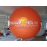 Le ballon gonflable orange d'hélium de la publicité avec l'impression protégée
