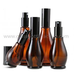 China 20ml & 30ml &50ml Amber Essential Oil Glass Bottles With Black Pumps supplier