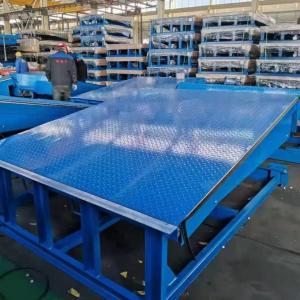 China Logistic Park High Volume Hydraulic Driving Loading Dock Leveler Heavy Duty Steel Aluminium Bumper Fixed Truck Dock supplier