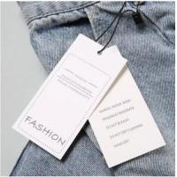 China Biodegradable Stone Paper Packaging Clothing Label Stone Paper Products on sale